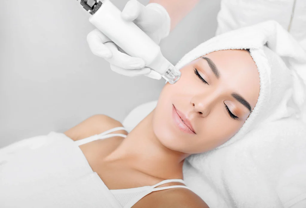 Patient receiving HydraFacial Keravive for scalp rejuvenation in Cranston, RI